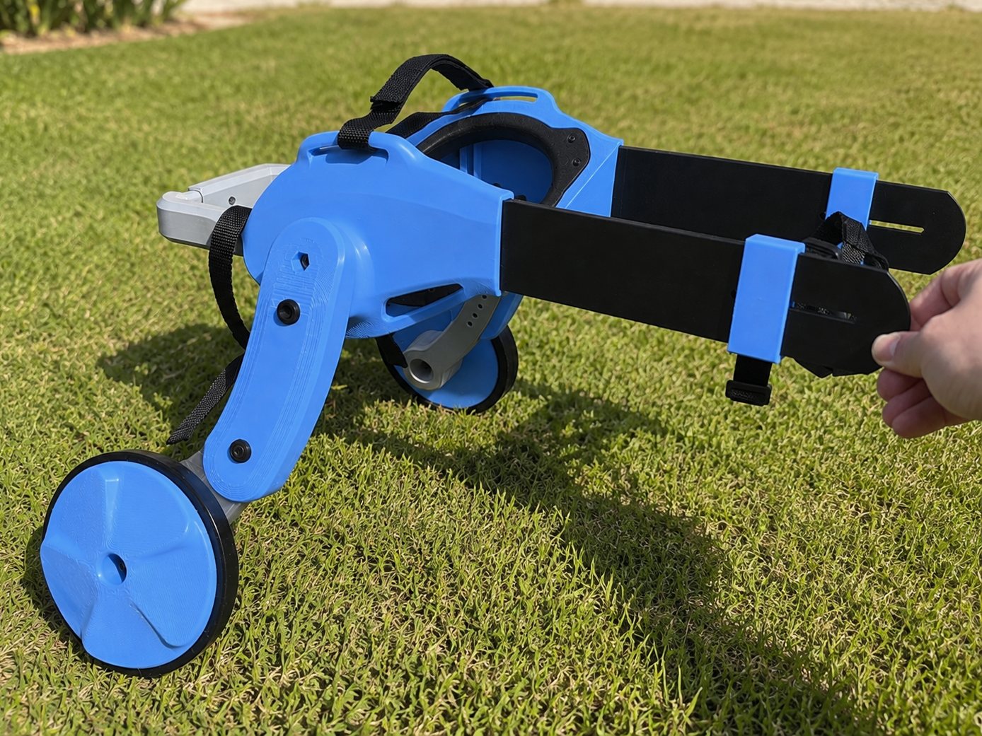 A Petwheels wheelchair on the grass